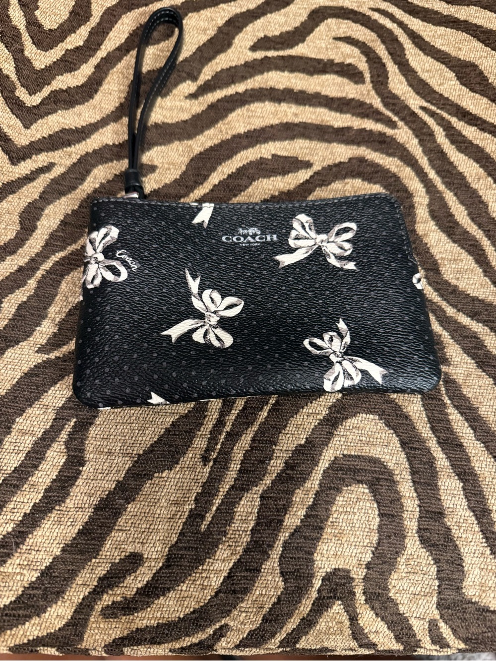 Coach Black Wristlet with White Bow Print